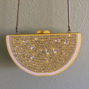 Kate spade lemon wedge clutch.